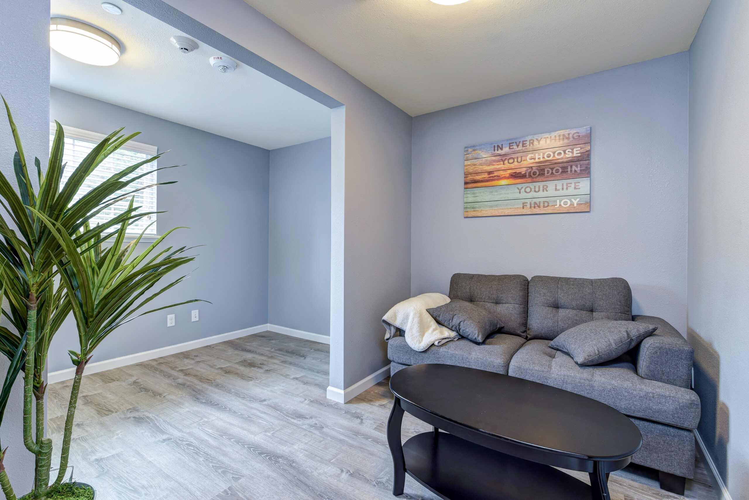 Career Resources outpatient treatment center with gray couches and coffee table