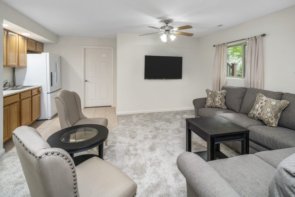 Gray couches in a circle in a living room