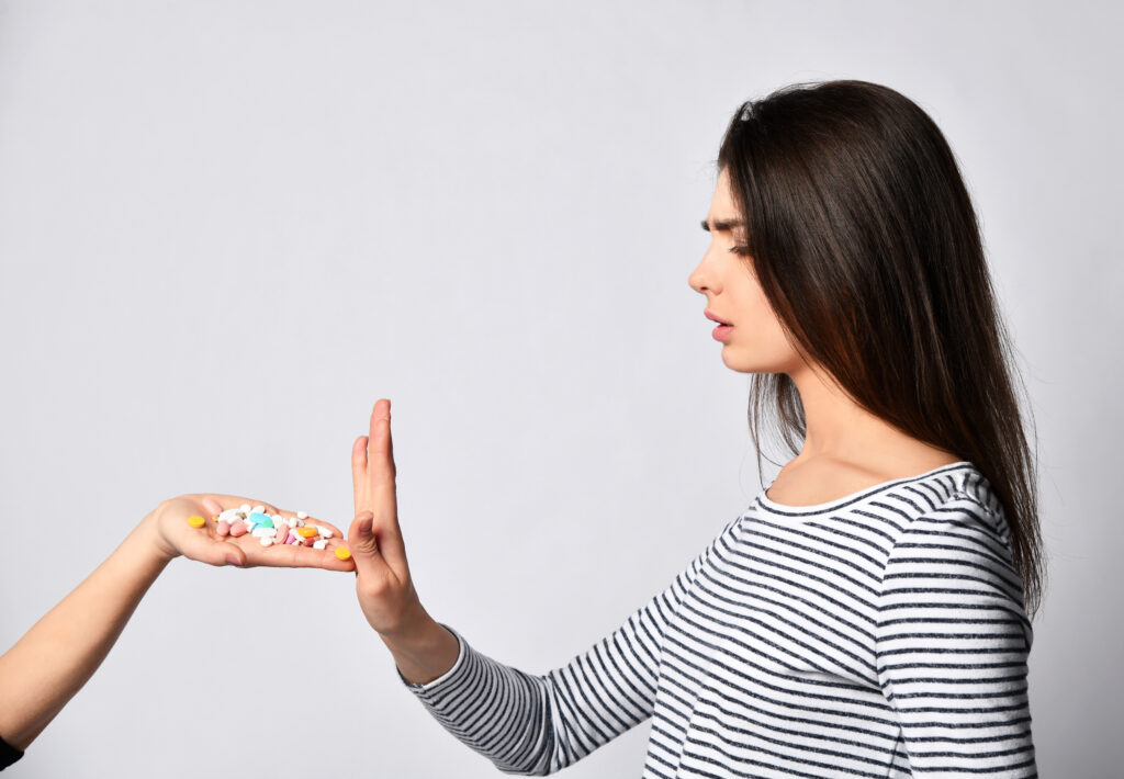 A young woman tries to break the addiction cycle by saying to to opioid pain pills.