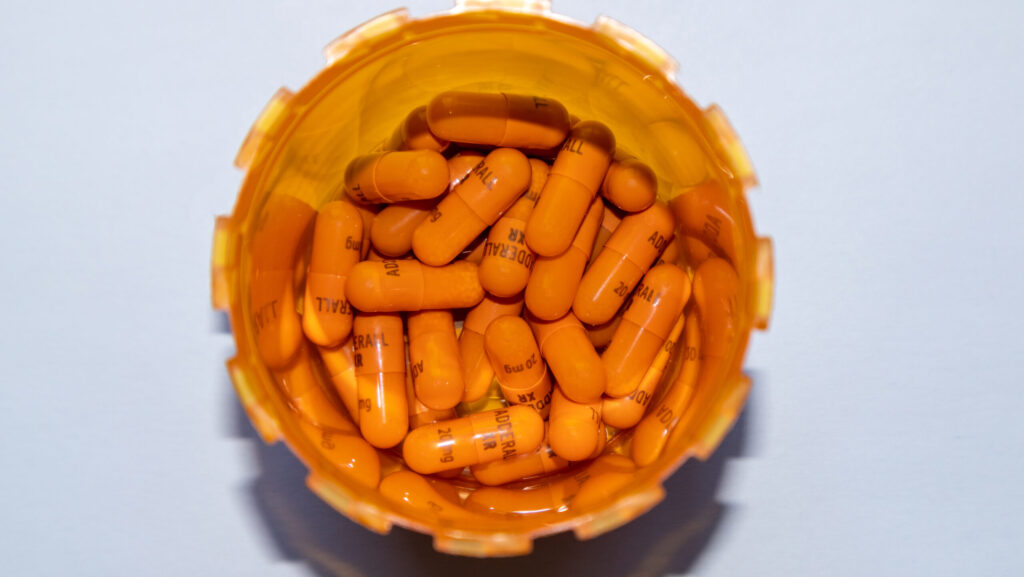 Inside the orange pharmacy bottle of Adderall XR represents its popularity for treating ADHD and how it differs from Dexedrine.