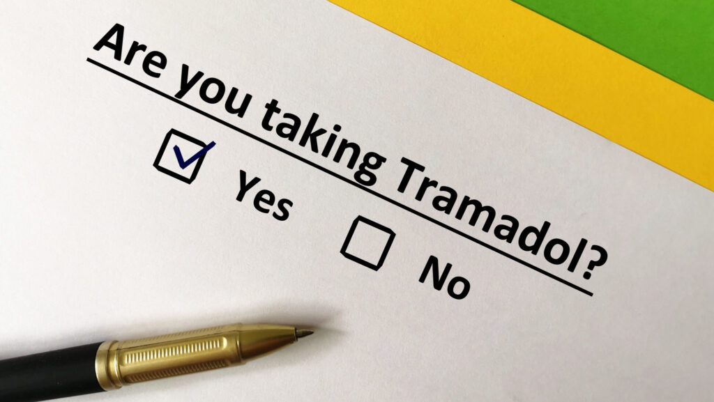 A white paper with words are you taking tramadol and a yes or no answer box represents the difference between tramadol vs toradol.